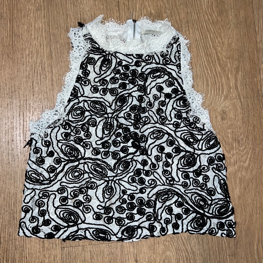 Zara Trafaluc white lace sleeveless blouse with black embroidery